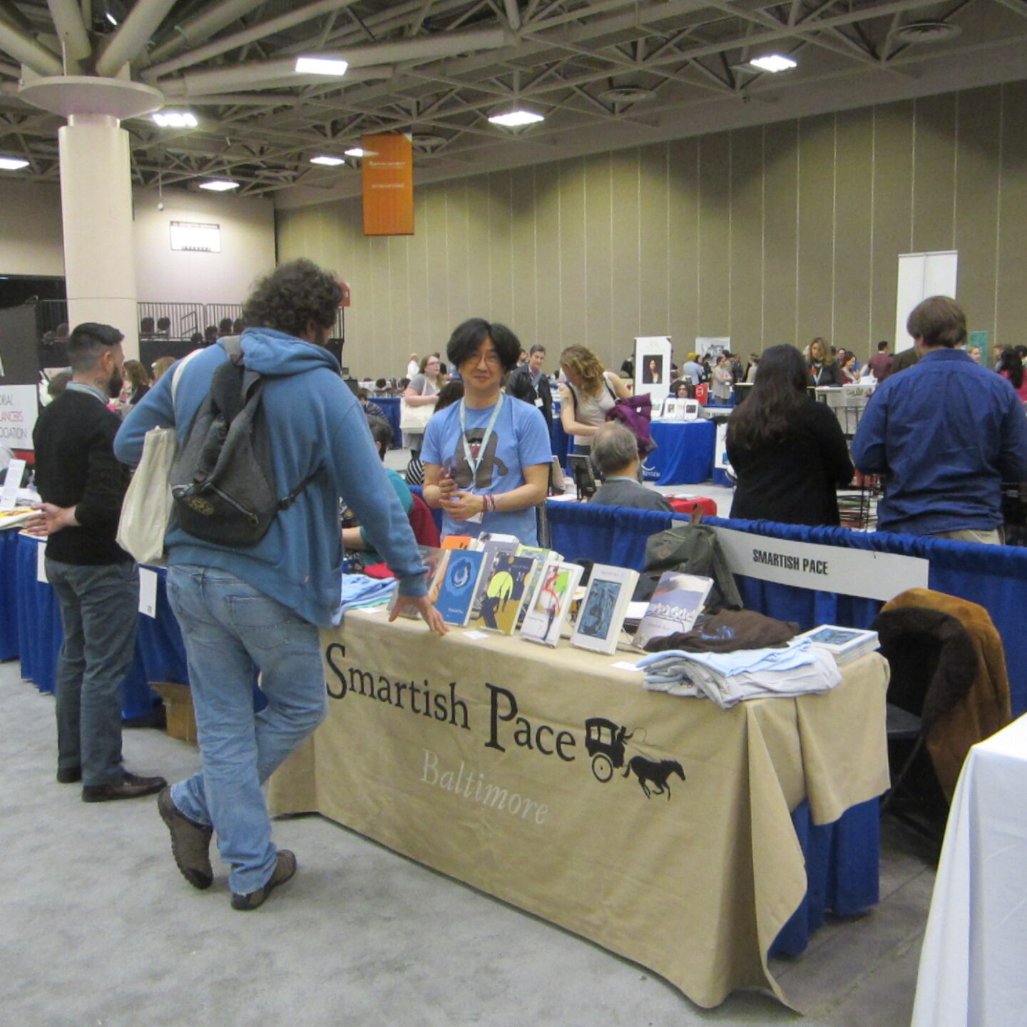 A group of event-goers on a book sale event